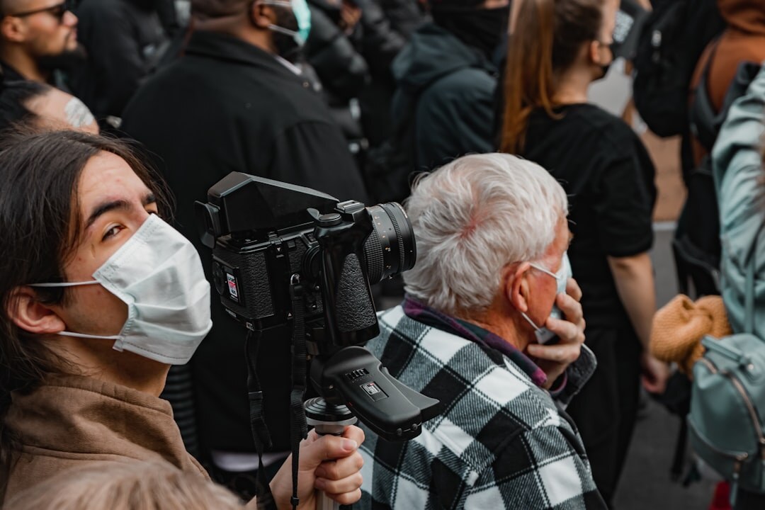 Journalist interviewing a guest with microphone