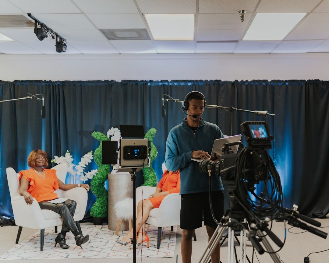 TV presenter rehearsing in front of camera
